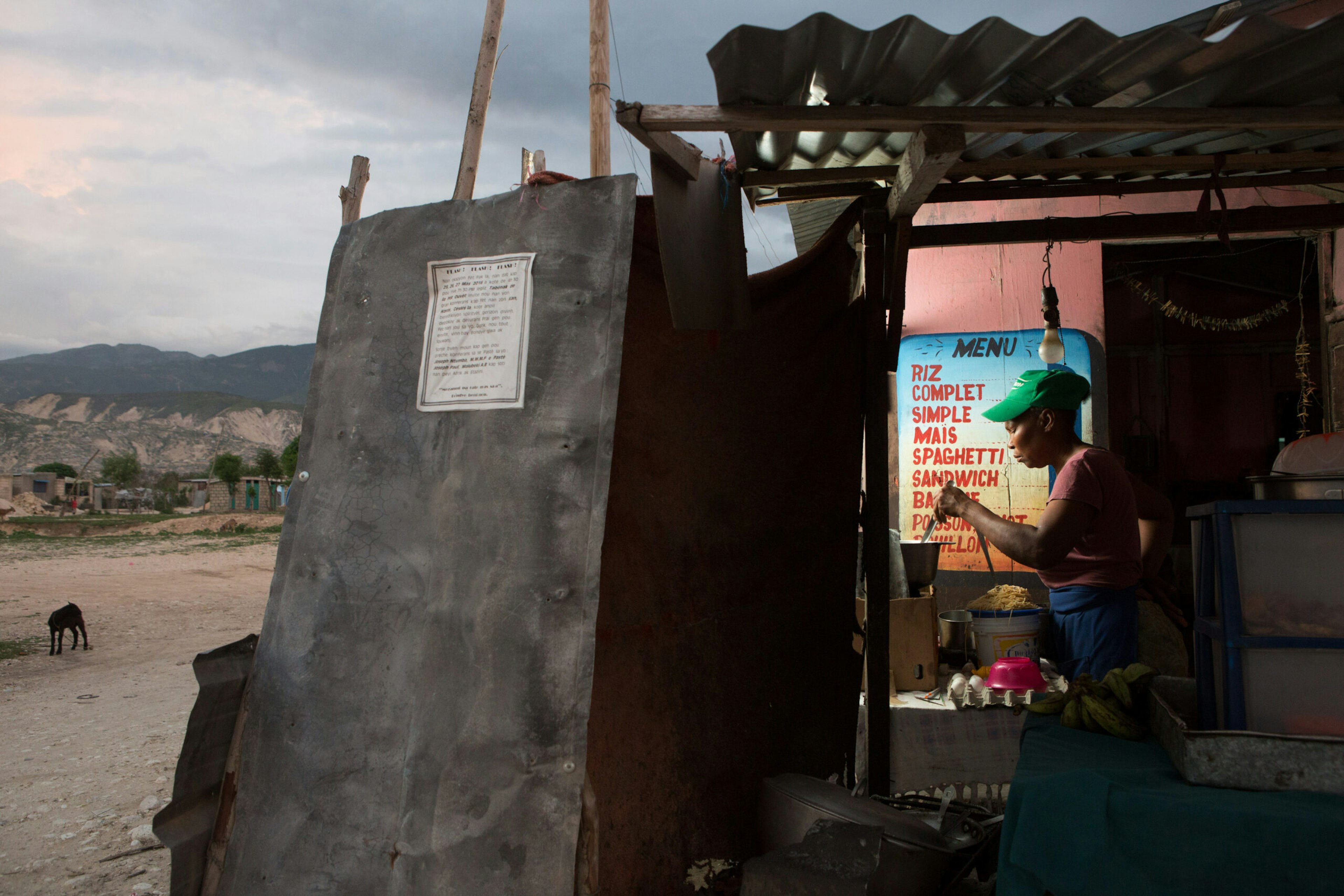 Brevil Andremaine manages and operates a restaurant on her own in the Corail section of the Canaan settlement outside Port-au-Prince, Haiti, May 9, 2016.