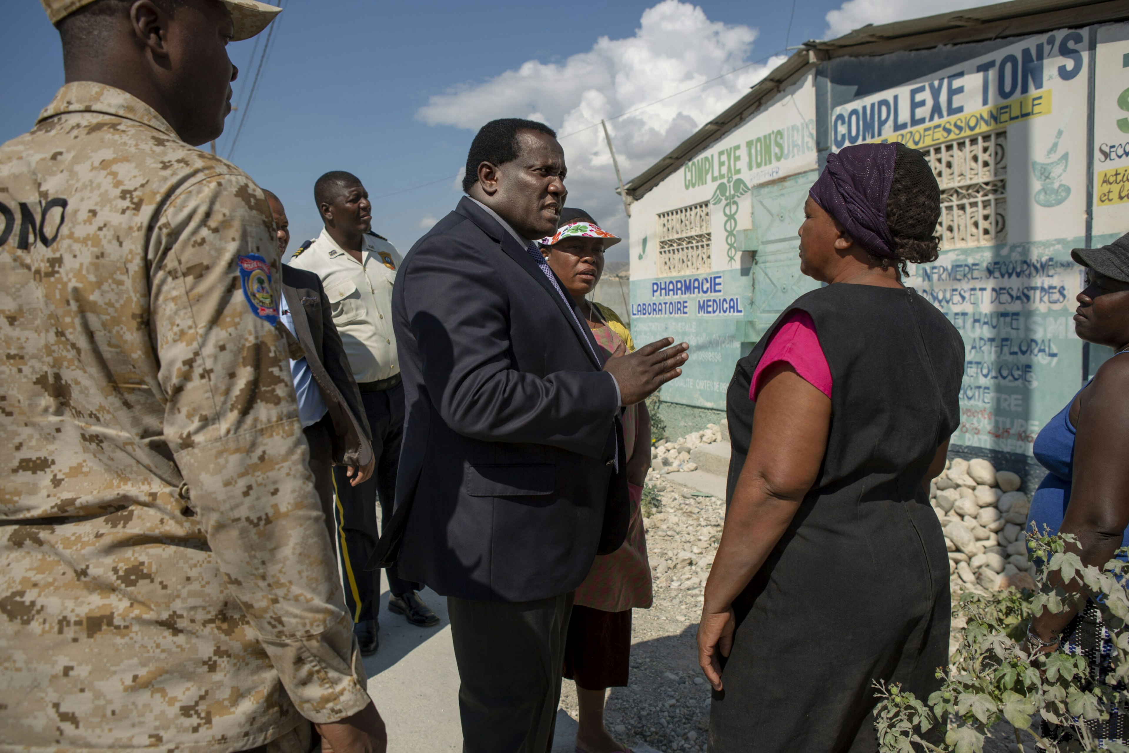 Rony Colin, then-mayor of Croix-des-Bouquets, Haiti, speaks to residents in the Canaan settlement outside Port-au-Prince, Jan. 11, 2019.