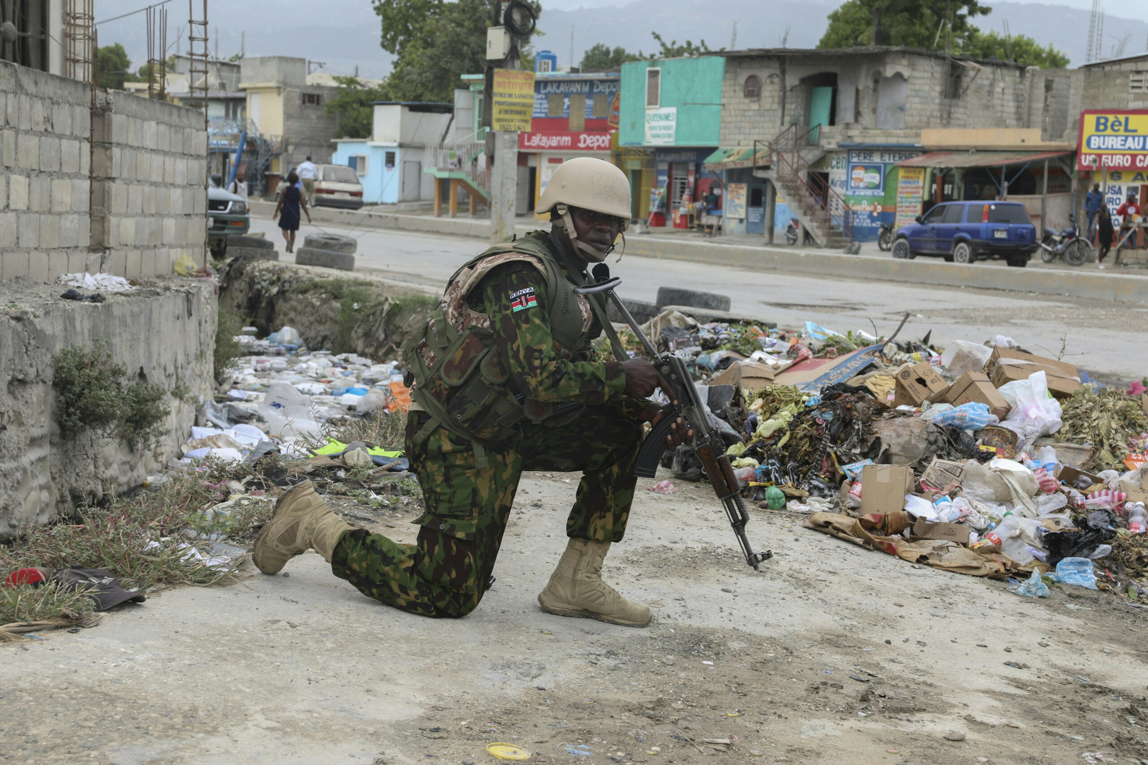 A Kenyan police officer patrols the area near the Toussaint Louverture International Airport in Port-au-Prince, Haiti, July 3, 2024.