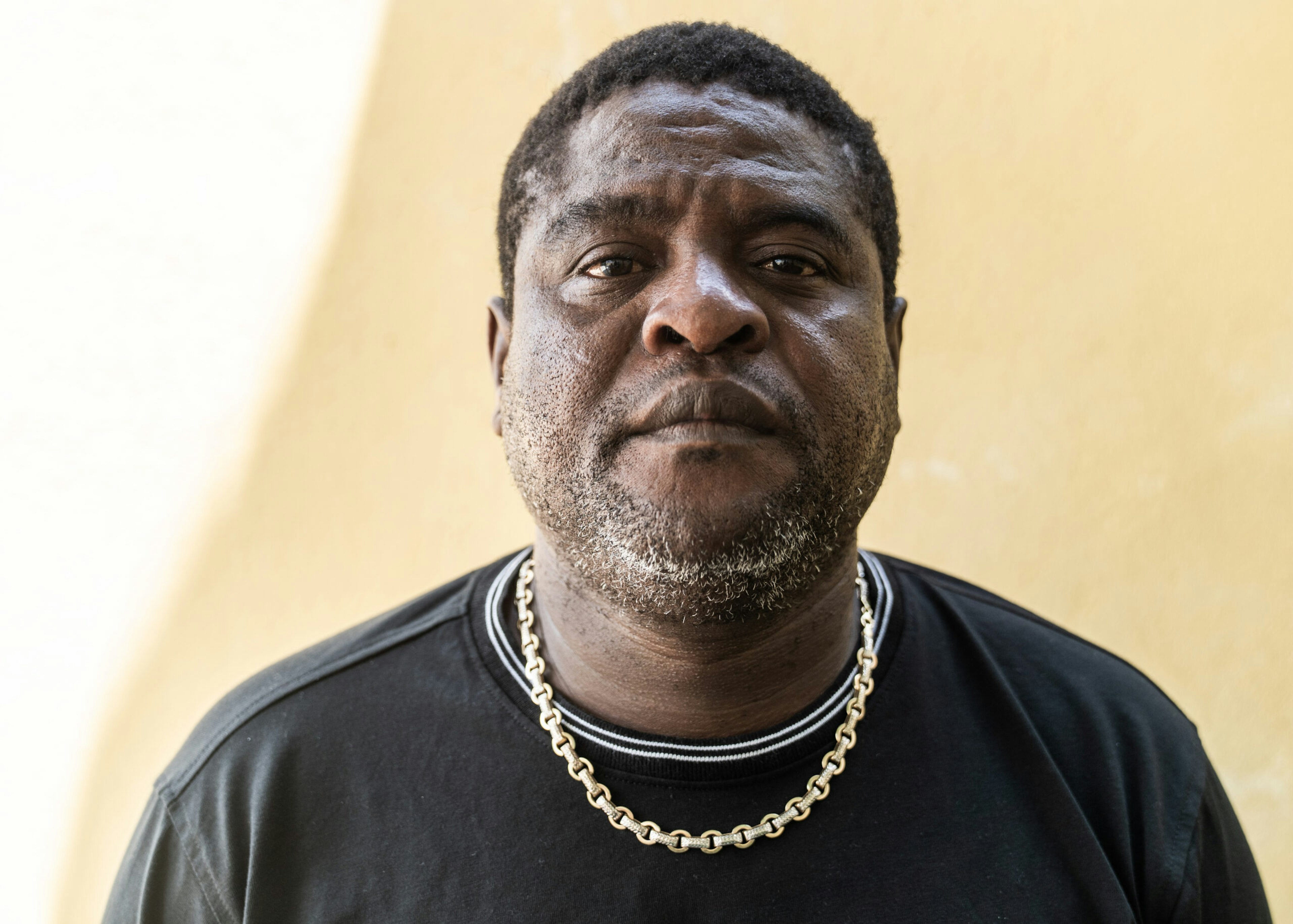 Jimmy 'Barbecue' Cherizier, leader of the Revolutionary Forces of the G-9 Family and Allies poses in the Delmas 6 neighborhood on May 9, 2024 in Port-au-Prince, Haiti.