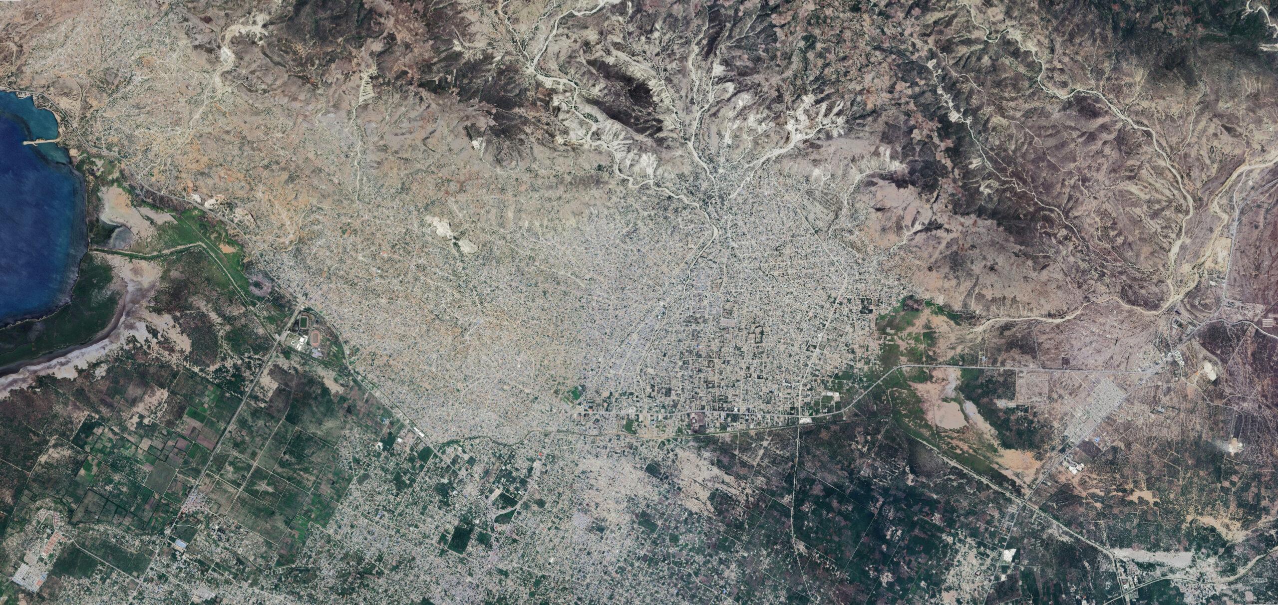 A satellite view of Canaan, Haiti, May 6, 2023. Over 13 years, Canaan's population and development ballooned.